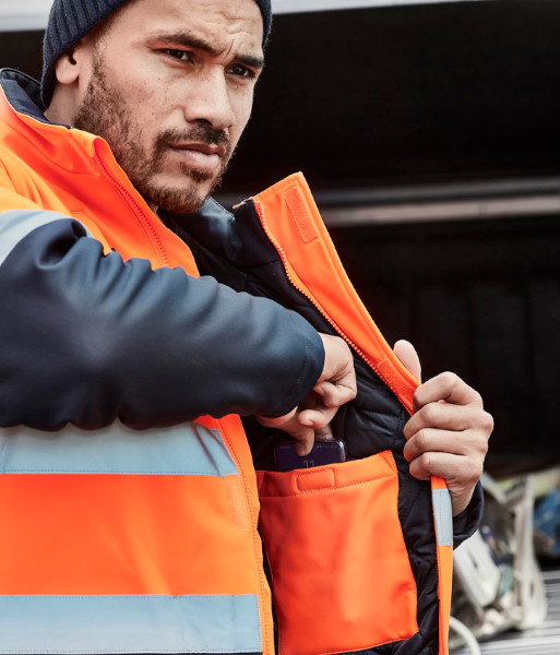 ZJ553 Syzmik Unisex Hi-Vis Day/Night Antarctic Softshell Jacket, Orange/Navy, Sizes 2XS to 7XL