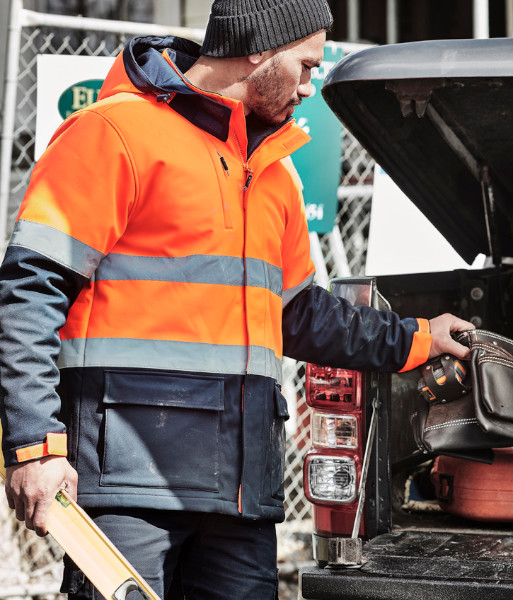 ZJ553 Syzmik Unisex Hi-Vis Day/Night Antarctic Softshell Jacket, Orange/Navy, Sizes 2XS to 7XL